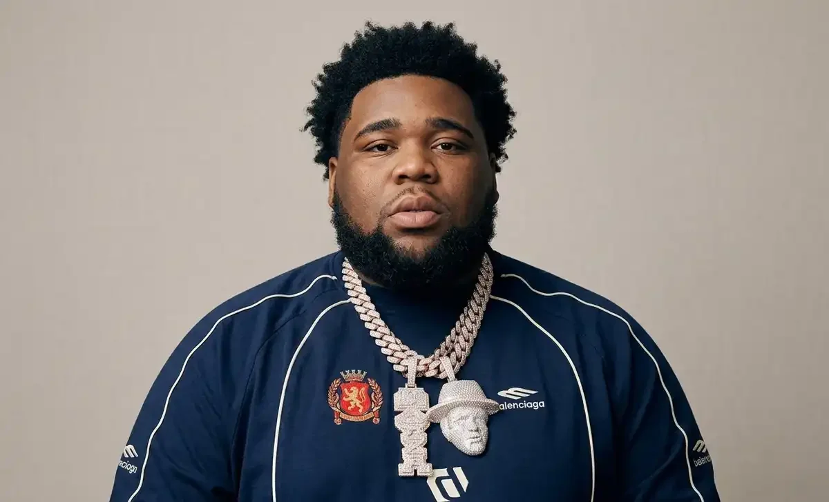 Rod Wave net worth 2026 — rapper performing on stage showing his rise from St. Petersburg to hip-hop wealth
